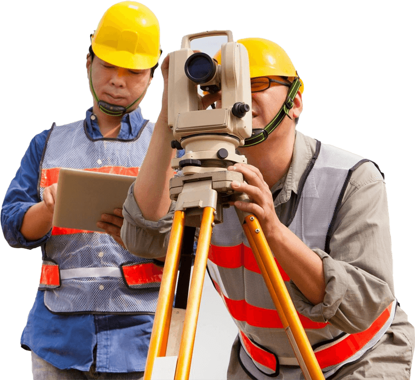 Two construction workers looking at a surveyor's equipment.